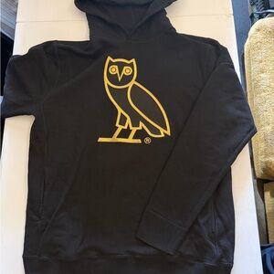 Black Hoodie with Gold Owl Design